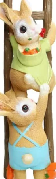 Decorative bunny figurine on a ladder
