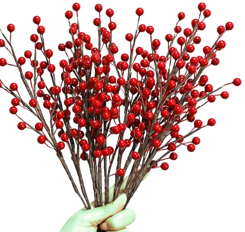 Bunch of faux red holly berry branches