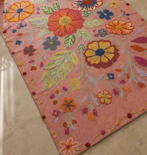 Blush embroidered rug