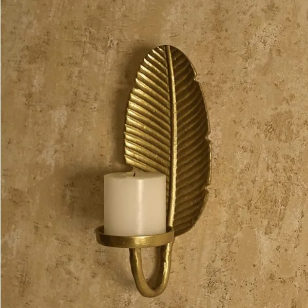Gold leaf wall sconce