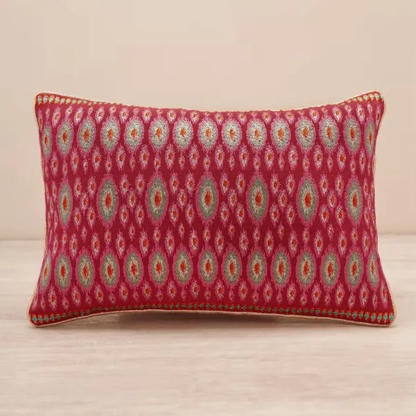 Red embroidered lumbar cushion