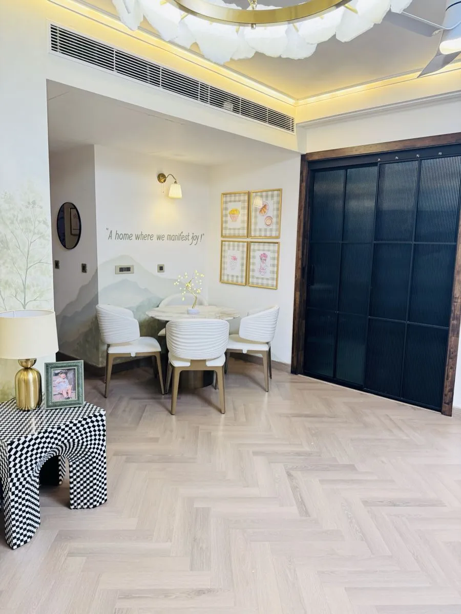 Herringbone wooden flooring in a dining nook