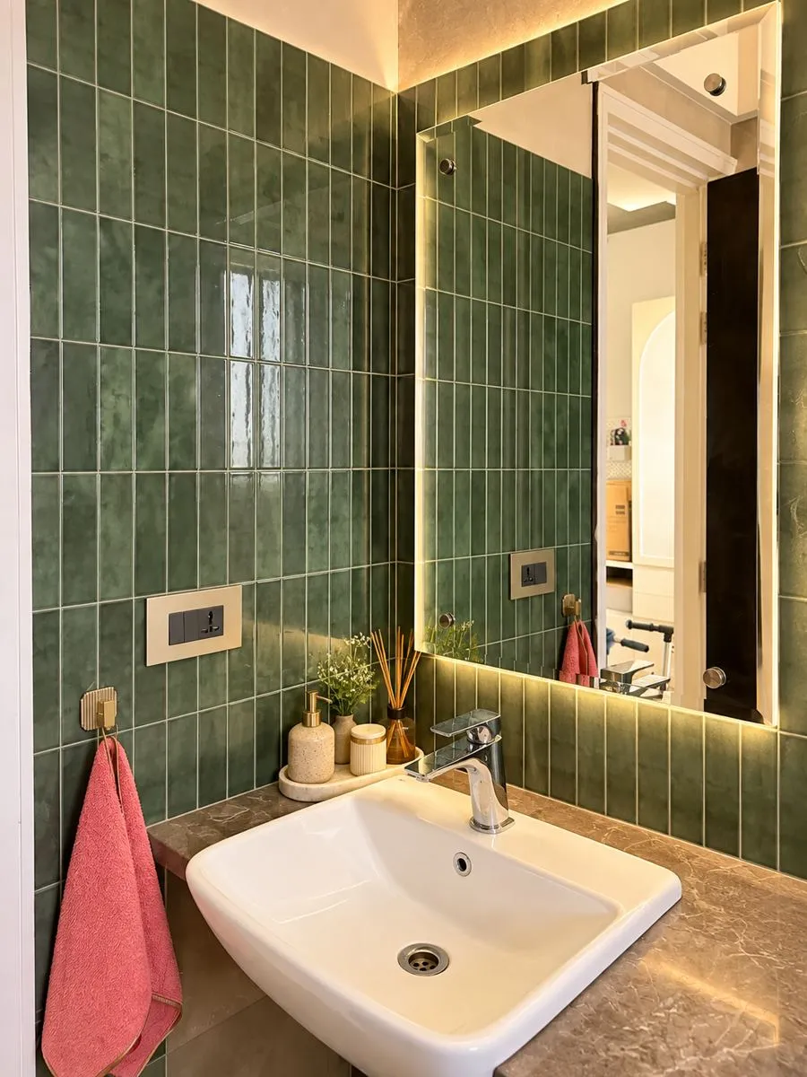 Bathroom with green vertical tiles