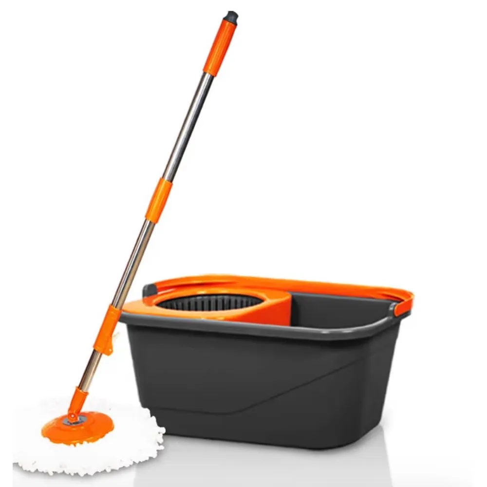 An orange and grey spin mop with a steel handle, standing beside its bucket with the wringer basket