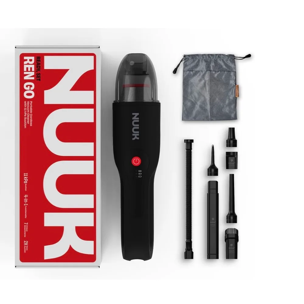A Nuuk Ren Go cordless handheld vacuum with its seven attachments and a storage bag