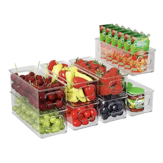 Six clear fridge bins with handles, filled with grapes, strawberries, peppers and drink pouches