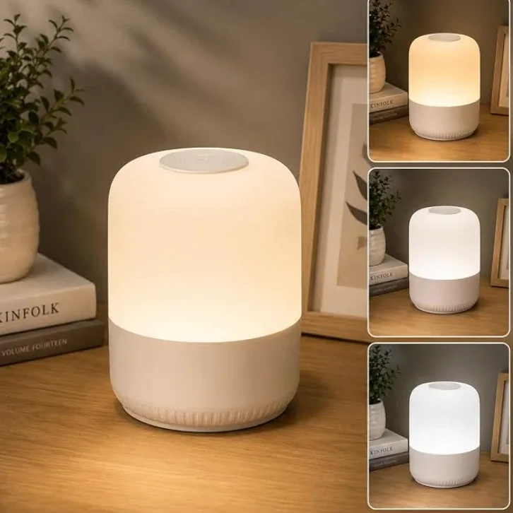 A small rechargeable bedside lamp with a rounded shade, shown in warm, soft and cool white