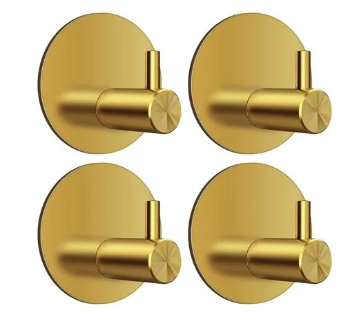 Four round gold self-adhesive wall hooks