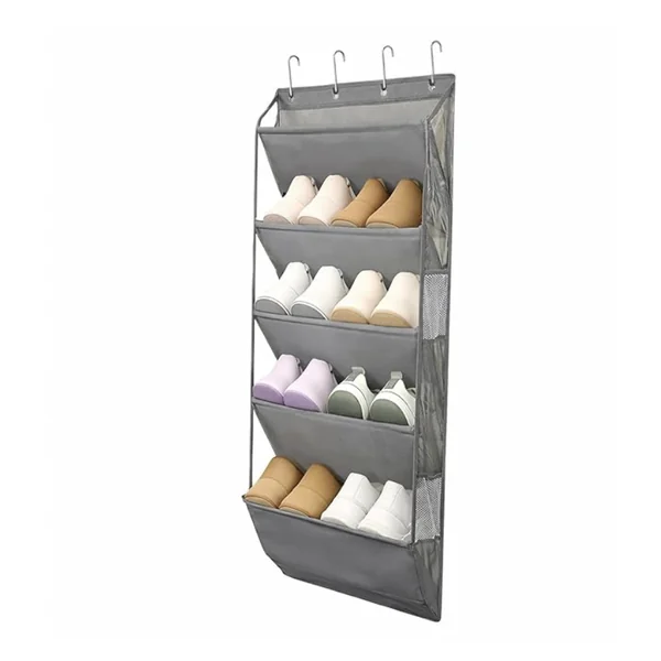 A grey four-tier over-door shoe organiser hanging on metal hooks, holding shoes