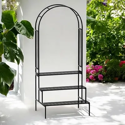 Black arched metal plant stand with steps