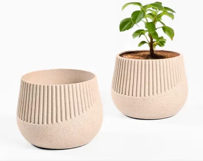 Two sand-coloured ribbed small pots