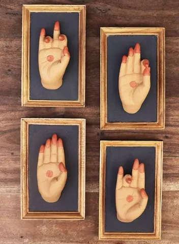 Set of four framed dancing mudra hands
