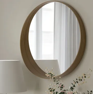 Round walnut veneer mirror
